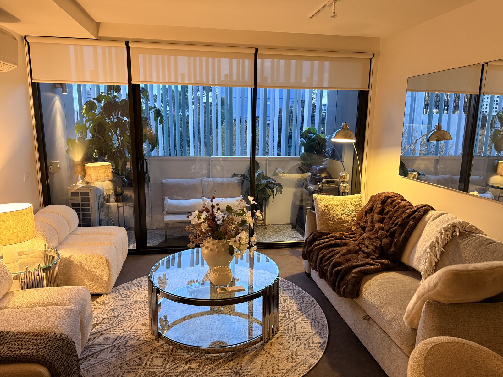 Luxury living room with designer furnishings and city views, Southbank residence
